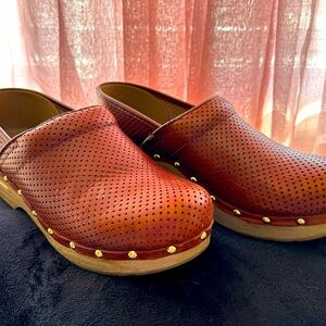Dansko clogs. Red/brown. Size 39 US 8.5. Gently loved. Damage shown in photos.